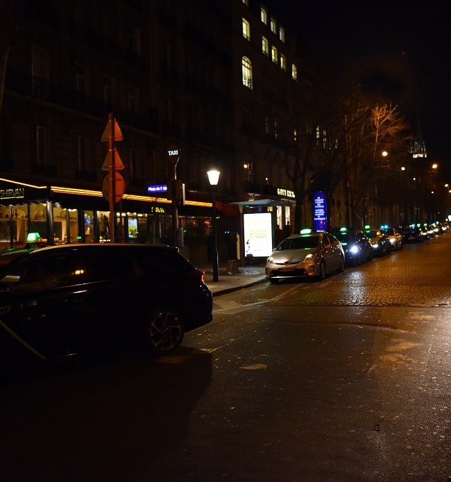 Taxis wait patiently. 