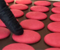 Piping macaron shells