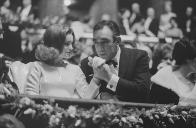 Romy Schneider and Anthony Quinn, 1963 with Anthony kissing Romy's hand
