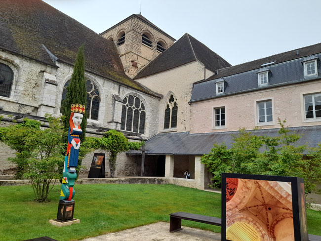 Cloister of the Priory of St Ayoul and the parish church