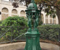 Wallace fountain in the street rue Saint-Éleuthère, Montmartre, Paris 18th arrondissement, France.