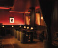 A red dance bar with plush and warm seats