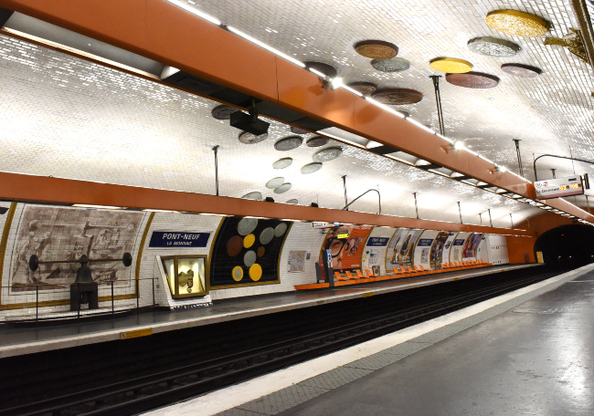 Coins on the roof of the Metro station