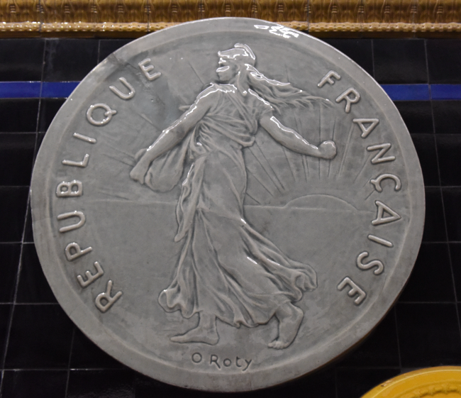 Close up of a large replica coin